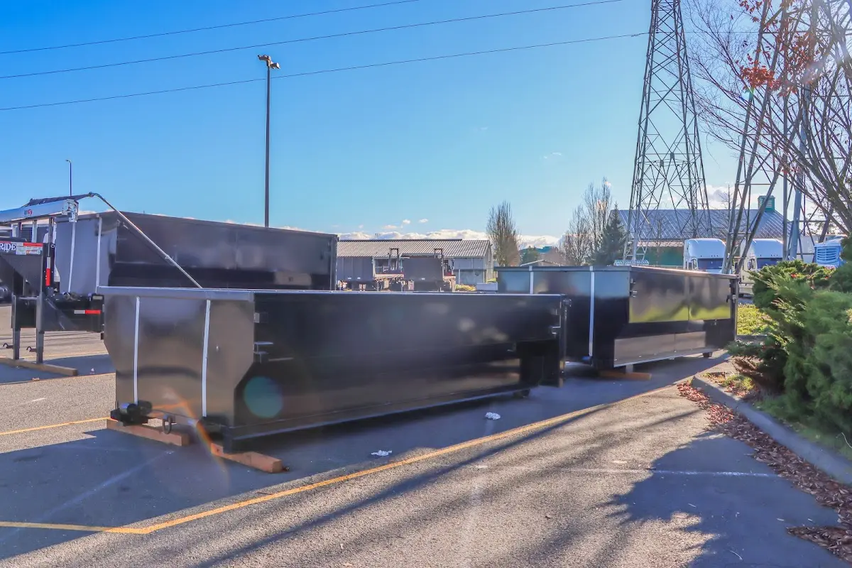 Roll-off dumpster ready for waste disposal at job site for 12 Yard Dumpster Rental in Bay Minette